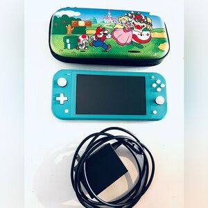 Nintendo Switch Lite - Blue What Case And Power Cord Conditions in Great Working